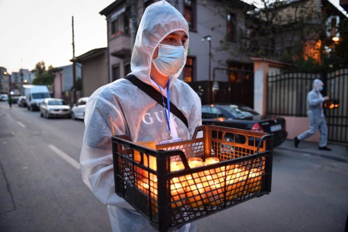 fotografie-bucuresti-inviere-voluntari-imaginea-saptamanii-the-guardian