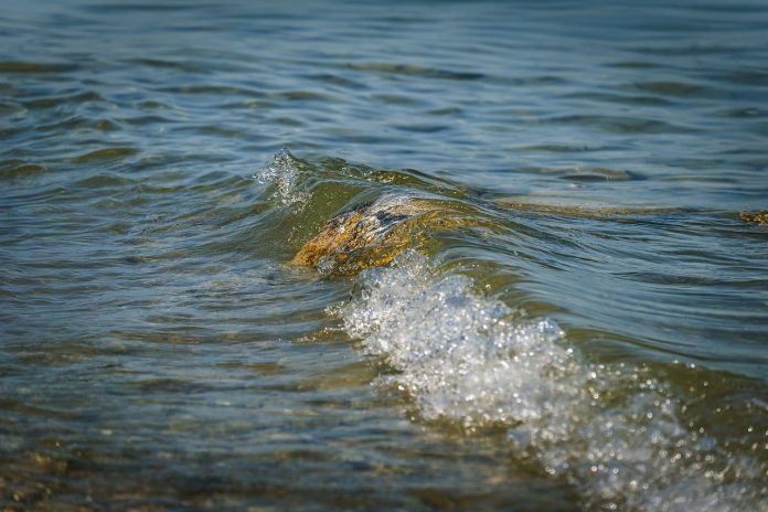 water, wave, rock, reflection, lake, splash, submerged, nature, calm, outdoors, water surface, water ripple, clear, sun, tide, summer, wet, wave reflection, no people