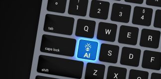 a close up of a keyboard with a blue button
