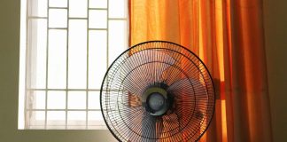 a fan in front of a window