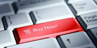 România, cel mai mare sector de e-commerce din Europa de Est: 12,9 miliarde de euro în 2025, de peste două ori mai mult decât în 2021 Red 'buy now!' button on a computer keyboard